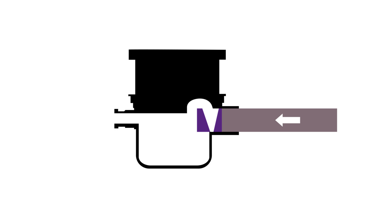 The backwater pumping station prevents backflow water from entering the building by counteracting the backflow pressure in the sewer