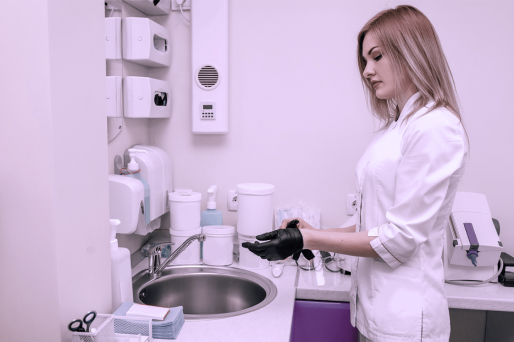 Dental laboratory A medical assistant working at a washbasin.