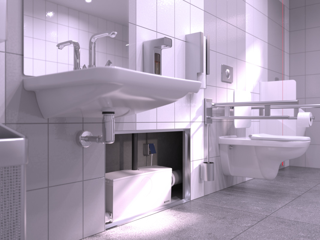 A close-up of a small lifting station installed in a wall cabinet, with a connected toilet and washbasin.