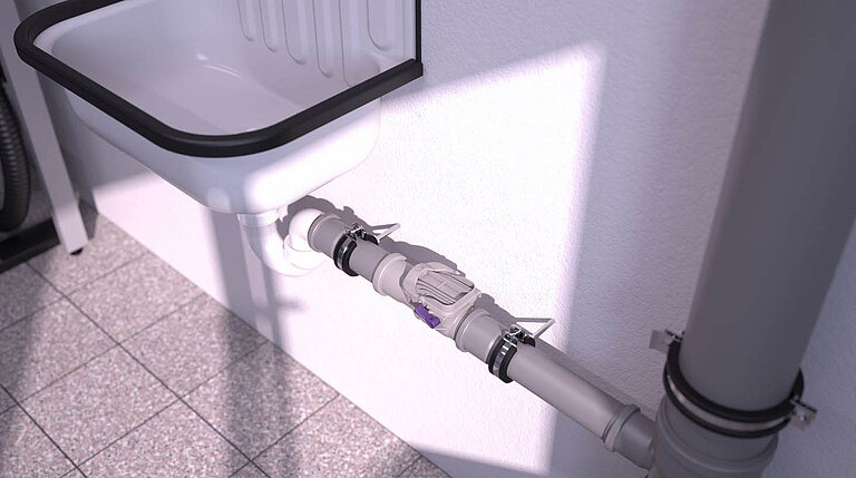 Staufix DN 50 backwater valve installed in an exposed drainage pipe Staufix DN 50 backwater valve installed in an exposed drainage pipe