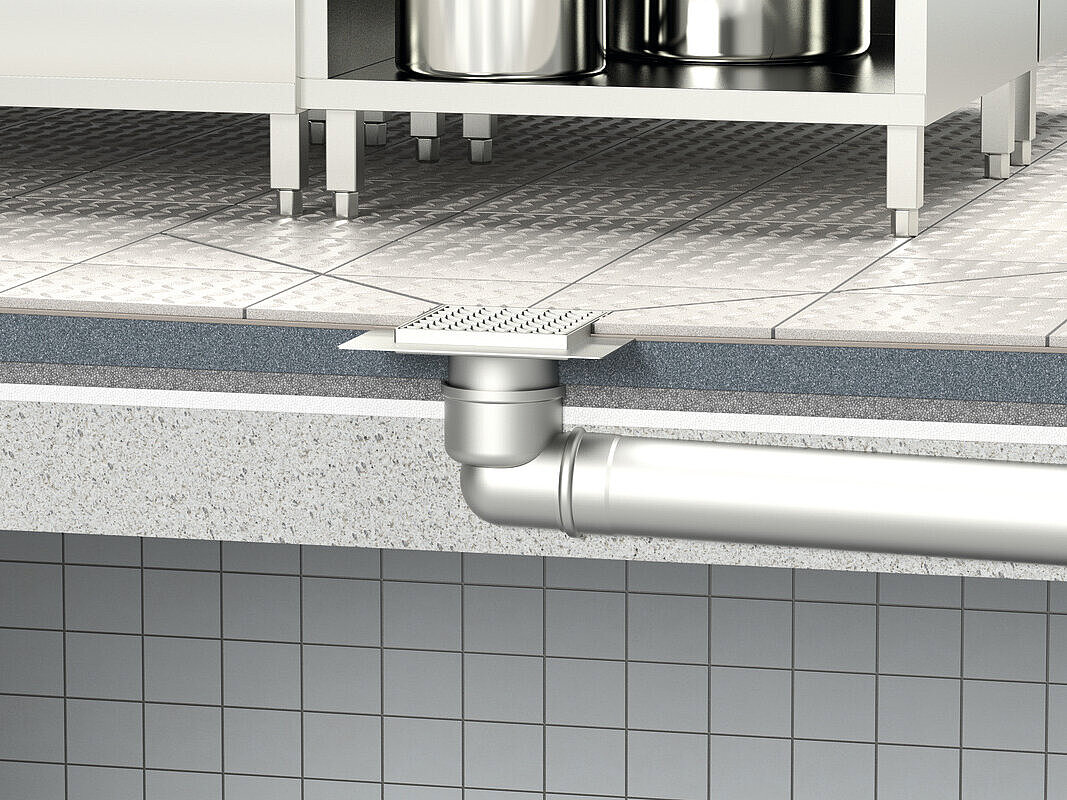 Installation diagram for the Ferrofix floor drain with a horizontal outlet with a cover in a commercial kitchen