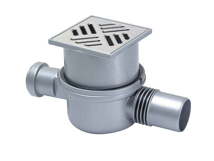 The Superflat bathroom drain with a slotted cover upper section