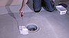 Fitting the glued flange to a floor drain